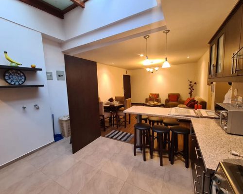 Beautiful Furnished 2BDR Apartment with High Ceiling Next to Yanuncay River - Social area